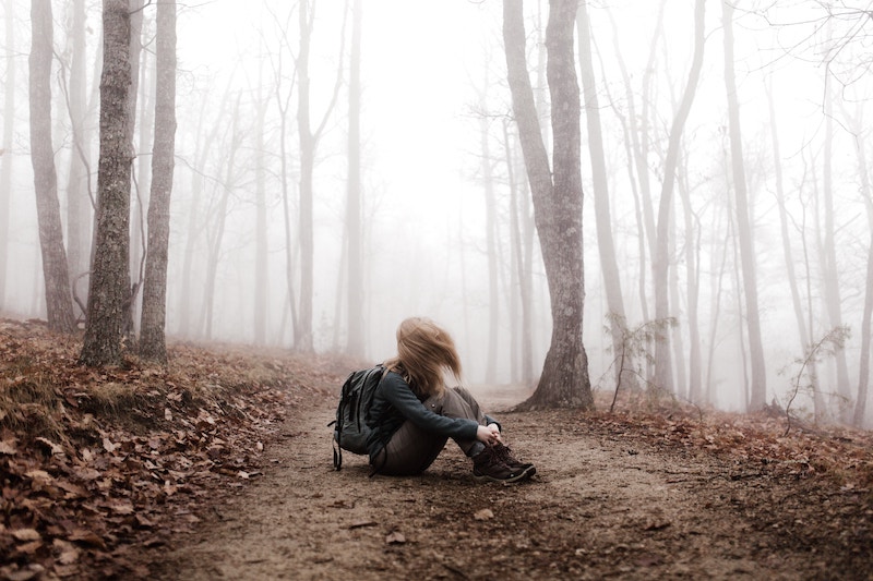 physician heal thyself woman alone in woods with backpack